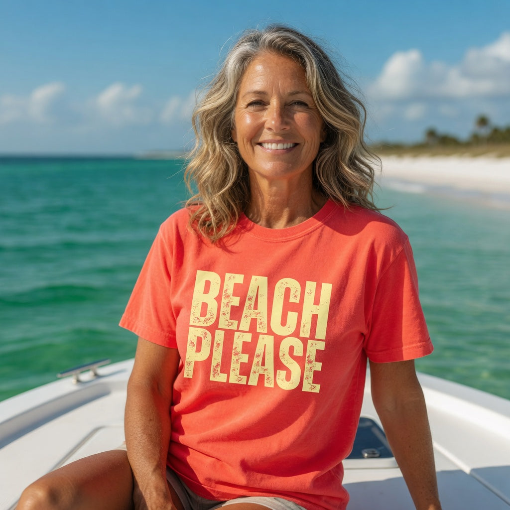 Woman on a boat wearing a Shell Hash Republic Comfort Colors T-Shirt with Beach Please graphic