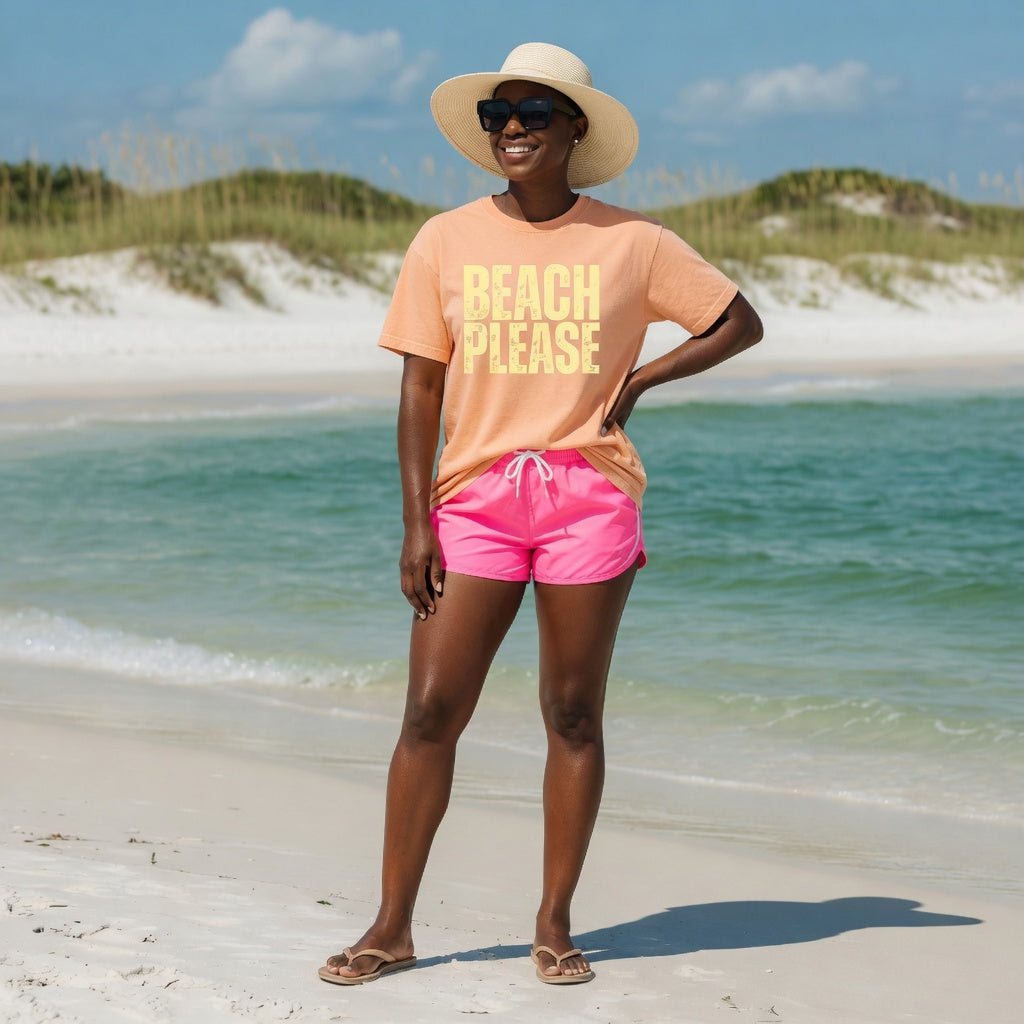 Shell Hash Republic Comfort Colors T-Shirt with Beach Please retro graphic tee, worn by a woman on a beach