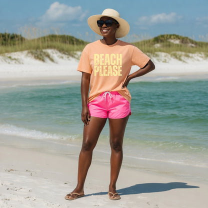 Shell Hash Republic Comfort Colors T-Shirt with Beach Please retro graphic tee, worn by a woman on a beach