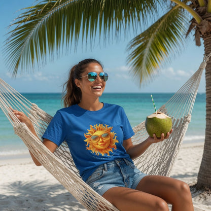Woman in Shell Hash Republic Comfort Colors Royal Caribe T-Shirt with Sun Solutions graphic, holding a coconut drink in a hammock on a beach