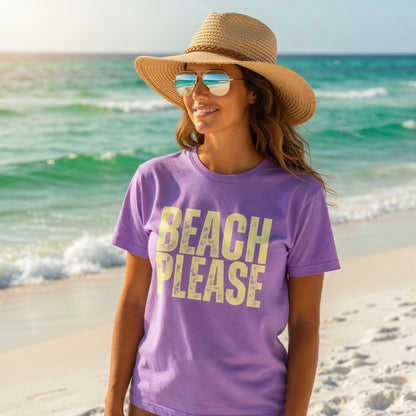 Shell Hash Republic Comfort Colors T-Shirt with Beach Please retro graphic, worn by a woman in a straw hat and sunglasses on a beach