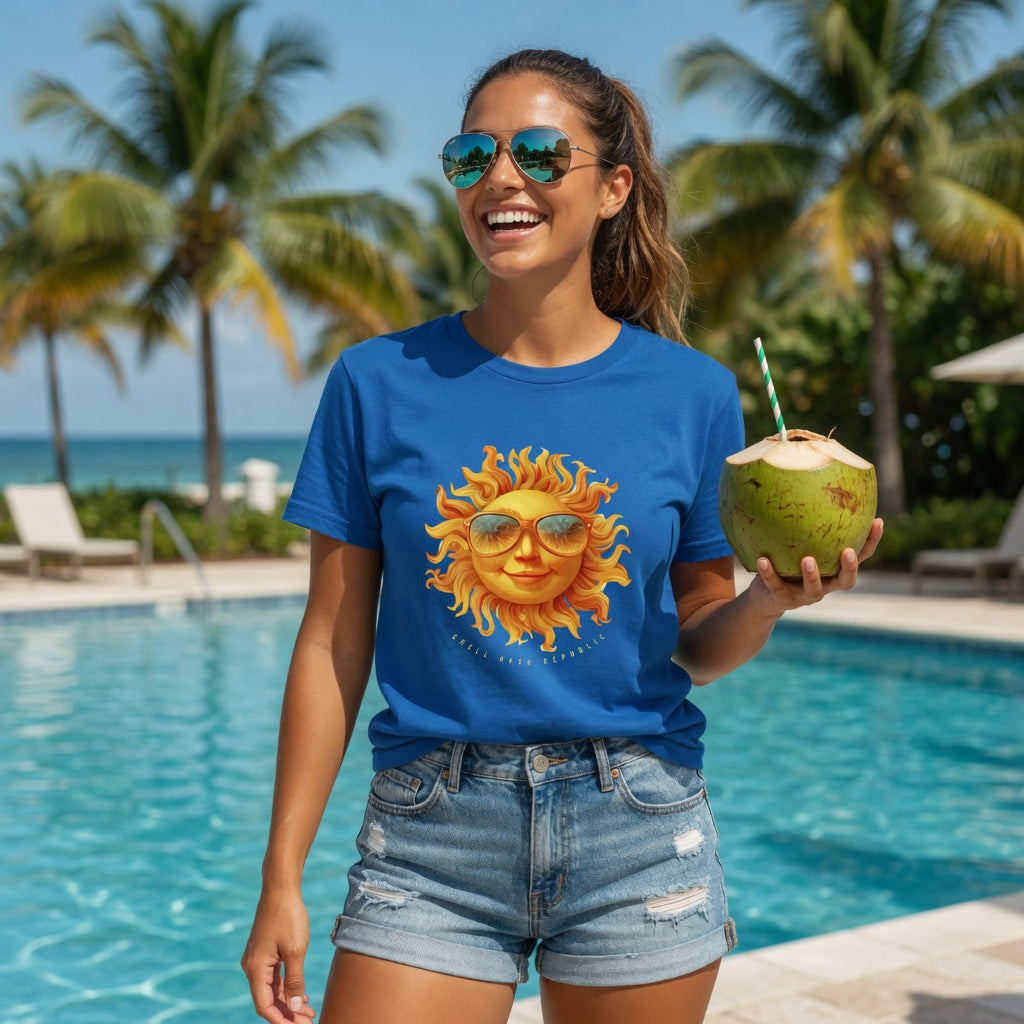 Shell Hash Republic Comfort Colors Royal Caribe T-Shirt with Sun Solutions retro graphic tee design, worn by a person holding a coconut drink by a pool